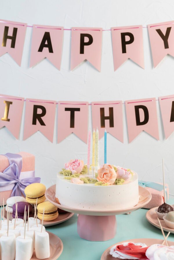 table-arrangement-birthday-event-with-cake-sweets